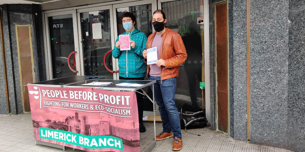 People Before Profit members holding a stall on the need to raise the minimum wage to tackle rising living costs.