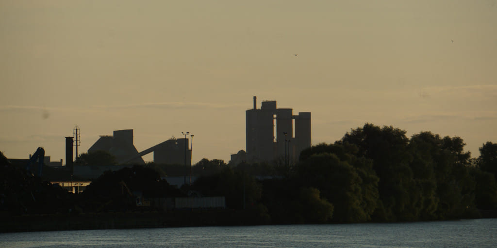 Irish Cement plant surrounded in a yellow haze from the pollutants it is emitting