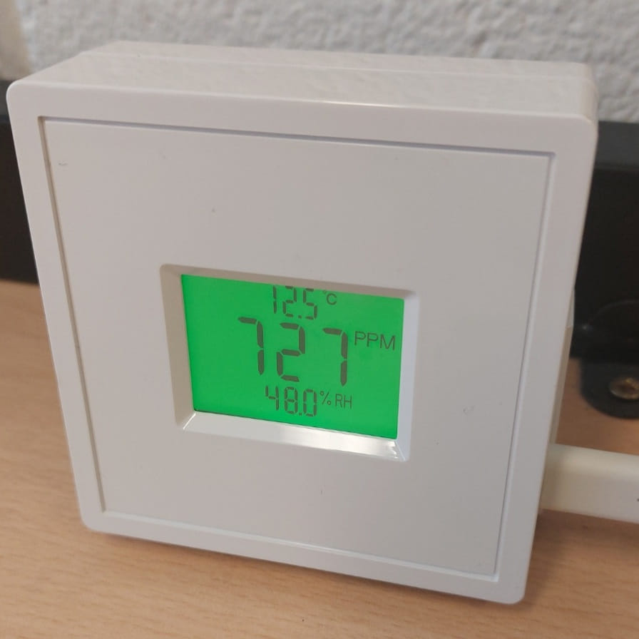 CO2 monitor measures neraly twice the level seen outdoors, in enclosed environments this measurement can be a proxy for the liklihood pathogens in the air.