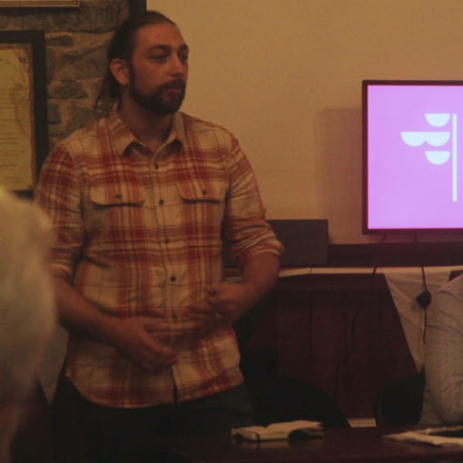 Ruairi Fahy answering questions from the crowd during the selection convention